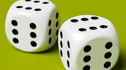 Two dice with six points on each side. Cheat concept [Image licensed to: Prater Raines for the HG Wells Short Story Competition from iStock 16/2/2026]