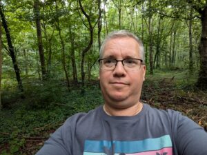 Matt surrounded by tall trees in the Black Forest